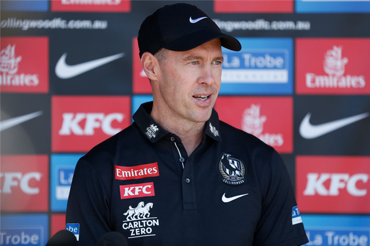 CRAIG MCRAE, Coach of the Magpies speaks with media after the Collingwood Magpies training session at Olympic Park Oval in Melbourne, Australia.