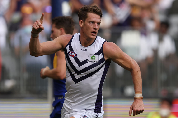 MATT TABERNER of the Dockers celebrates a goal during the AFL match between the West Coast Eagles and the Fremantle Dockers at Optus Stadium in Perth, Australia.