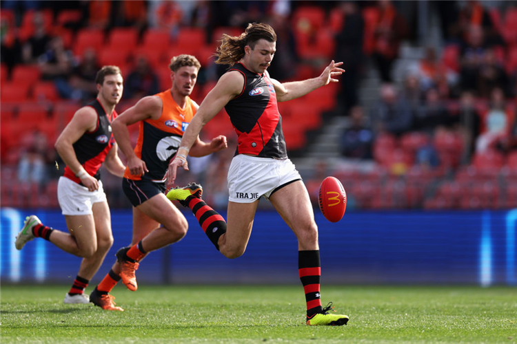 SAM DRAPER of the Bombers kicks during the AFL match between the Greater Western Sydney Giants and the Essendon Bombers at GIANTS Stadium in Sydney, Australia.