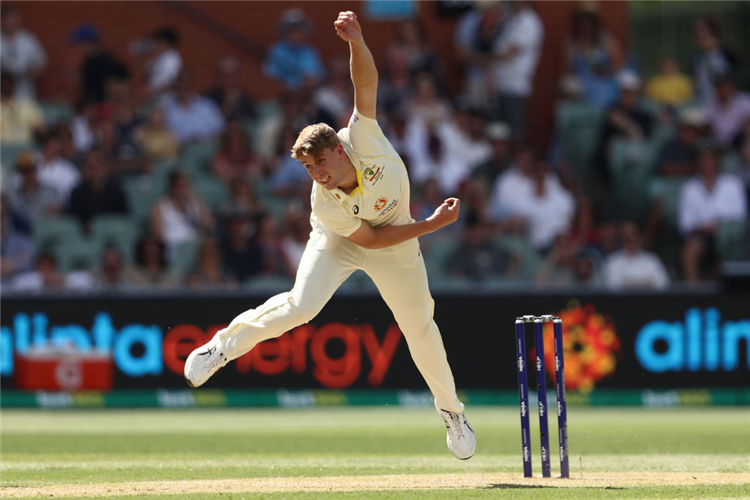 CAMERON GREEN of Australia bowls during the Test Match in the series between Australia and the West Indies at Adelaide Oval in Adelaide, Australia.
