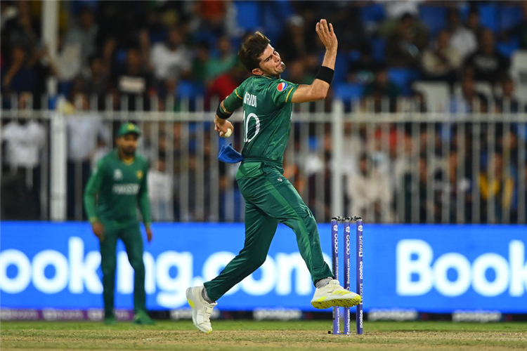SHAHEEN AFRIDI of Pakistan in bowling action during the ICC Men's T20 World Cup match between Pakistan and Scotland at Sharjah Cricket Stadium in Sharjah, United Arab Emirates.