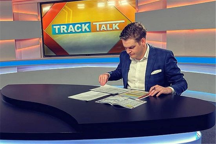 Race caller Pat Comerford getting ready for an episode of TrackTalk