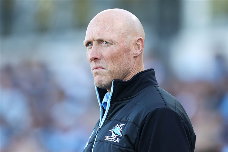 Sharks coach CRAIG FITZGIBBON watches on during the warm-up before the NRL match between the Cronulla Sharks and the Gold Coast Titans at Coffs Harbour in Australia.