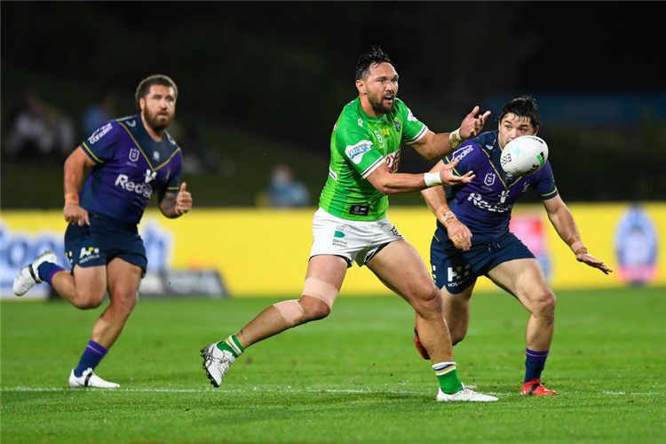 JORDAN RAPANA of the Raiders passes the ball during the NRL match between the Melbourne Storm and the Canberra Raiders at Sunshine Coast Stadium in Sunshine Coast, Australia.