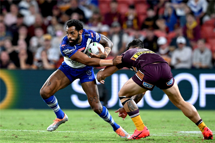 JOSH ADDO-CARR of the Bulldogs breaks away from the defence during the NRL match between the Brisbane Broncos and the Canterbury Bulldogs at Suncorp Stadium in Brisbane, Australia.
