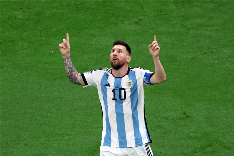 Lionel Messi of Argentina celebrates after scoring v France