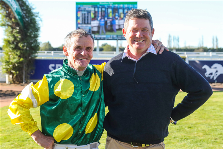 Rider Terry Moseley with co-trainer Shane Anderton after their win with talented filly Burgie