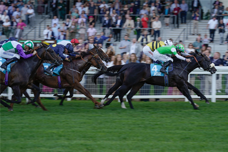 ANNAF (green silks) winning the Bengough Stakes at Ascot in England.