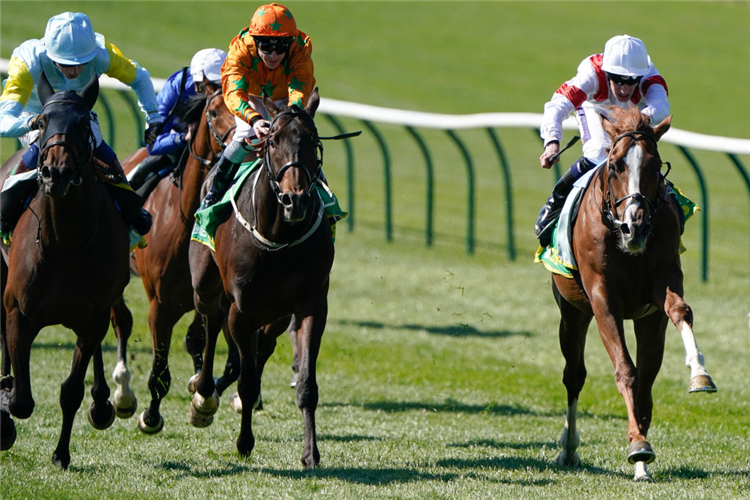 CANBERRA LEGEND (right, white cap) winning the Feilden Stakes at Newmarket in Newmarket, England.