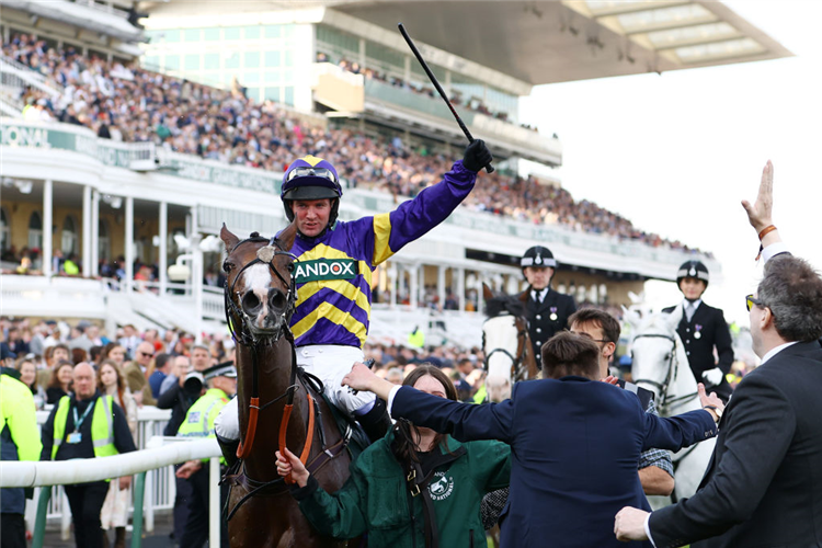 CORACH RAMBLER winning the Randox Grand National Handicap Chase at Aintree in Liverpool, England.