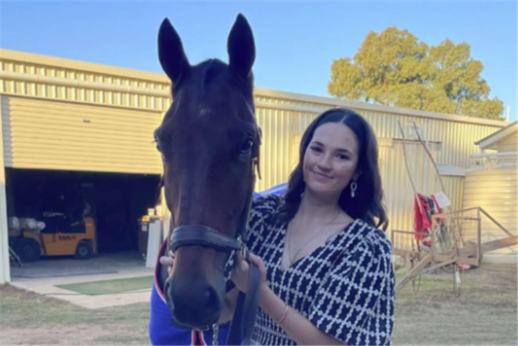 Trainer Courtney Laker with Curly James.