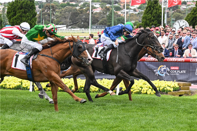 GUMDROPS (blue cap) winning the Crockett Stakes at Moonee Valley in Australia.