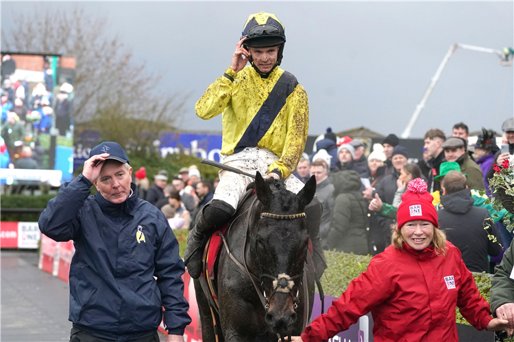 Jockey Michael O'Sullivan and trainer Barry Connell win the Bar One Racing Royal Bond Novice Hurdle at Fairyhouse with Marine Nationale