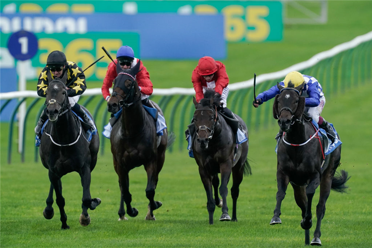 MATILDA PICOTTE (yellow cap) winning the Challenge Stakes at Newmarket in England.