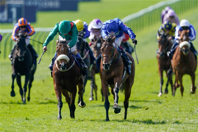 MAWJ (blue cap) winning the 1000 Guineas Stakes at Newmarket in Newmarket, England.