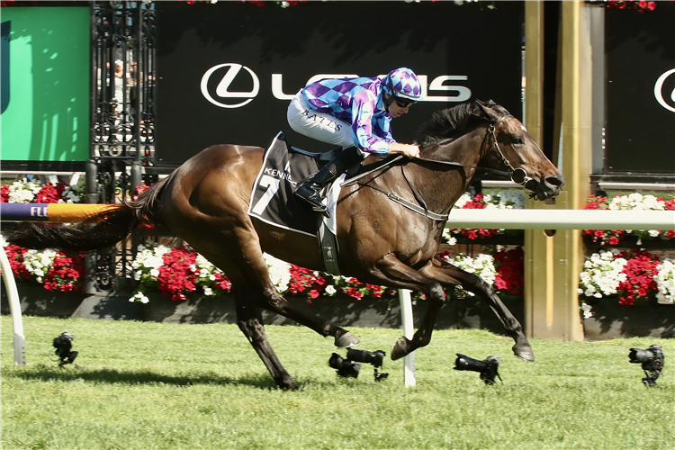 PRIDE OF JENNI winning the Kennedy Champions Mile at Flemington in Australia.