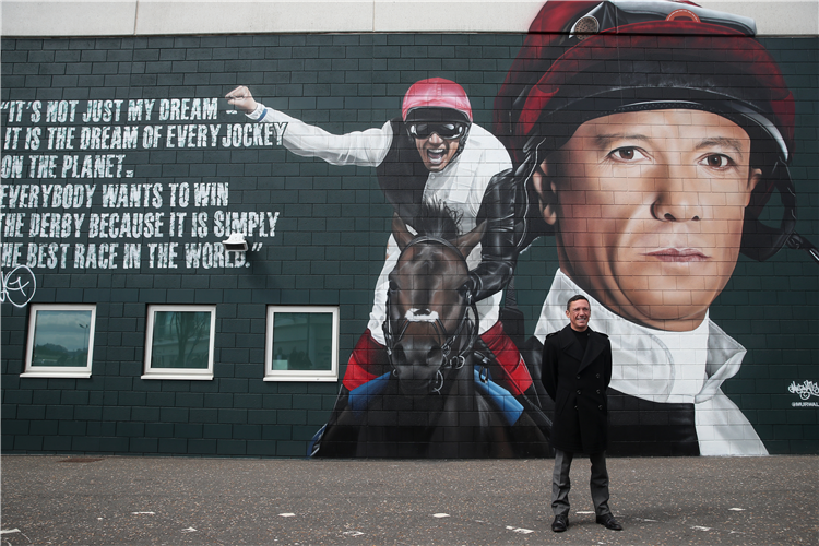 Jockey : FRANKIE DETTORI standing in front of a new mural of him unveiled at Epsom Downs Racecourse.