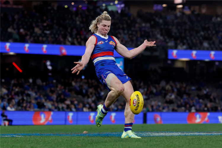 CODY WEIGHTMAN of the Bulldogs kicks a goal during the AFL match between North Melbourne Kangaroos and Western Bulldogs at Marvel Stadium in Melbourne, Australia.