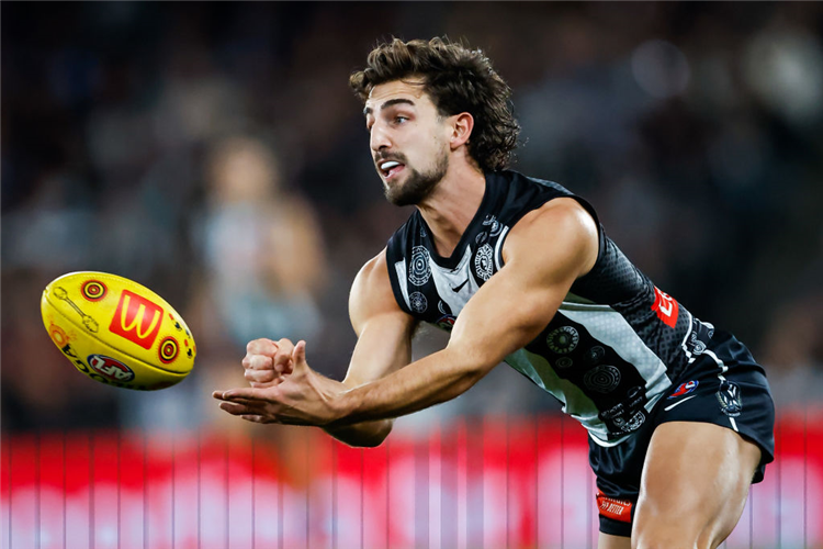JOSH DAICOS of the Magpies in action during the AFL match between the Collingwood Magpies and the North Melbourne Kangaroos at Marvel Stadium in Melbourne, Australia.