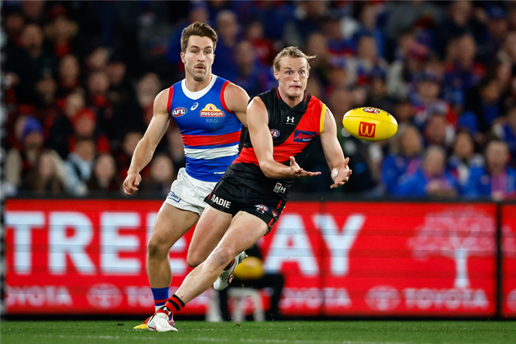 MASON REDMAN of the Bombers in action during the AFL match between the Essendon Bombers and the Western Bulldogs at Marvel Stadium in Melbourne, Australia.