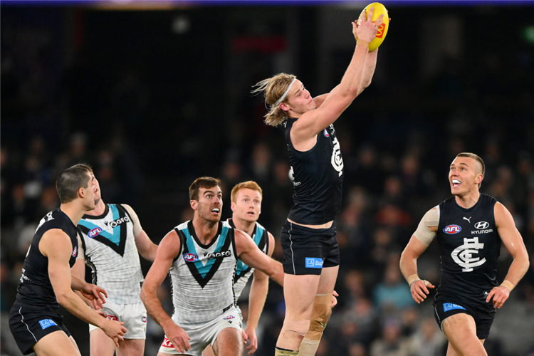 TOM DE KONING of the Blues during the AFL match between the Carlton Blues and the Port Adelaide Power at Marvel Stadium in Melbourne, Australia.