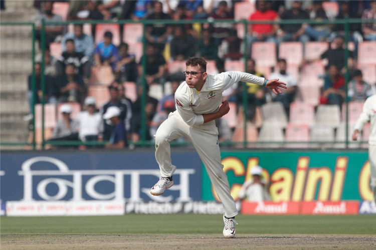 TODD MURPHY of Australia bowls during the Test match in the series between India and Australia at Arun Jaitley Stadium in Delhi, India.