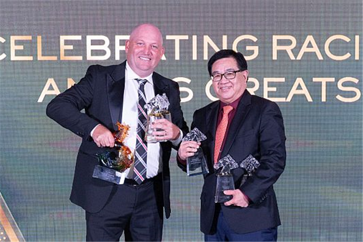 Trainer Daniel Meagher (left) and owner Mr Lim Siah Mong all smiles after bagging six awards between them at the Singapore Racing Awards 2022.