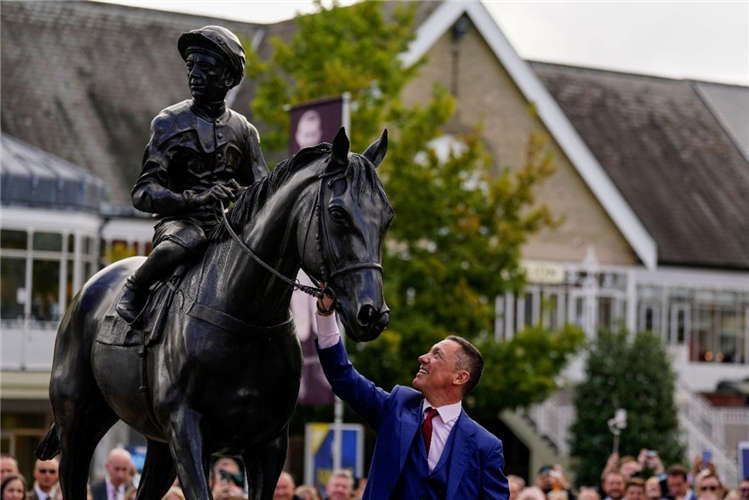 Frankie Dettori statue unveiled at Ascot Racecourse by Her Majesty The Queen on QIPCO British Champions Day.