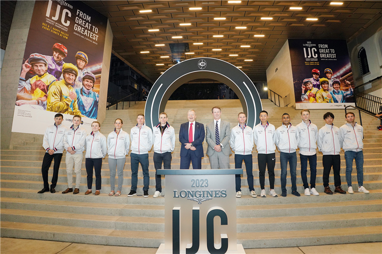 Hong Kong Jockey Club Chief Executive Officer Mr Winfried Engelbrecht-Bresges poses a group photo with the LONGINES International Jockeys’ Championship participating jockeys.