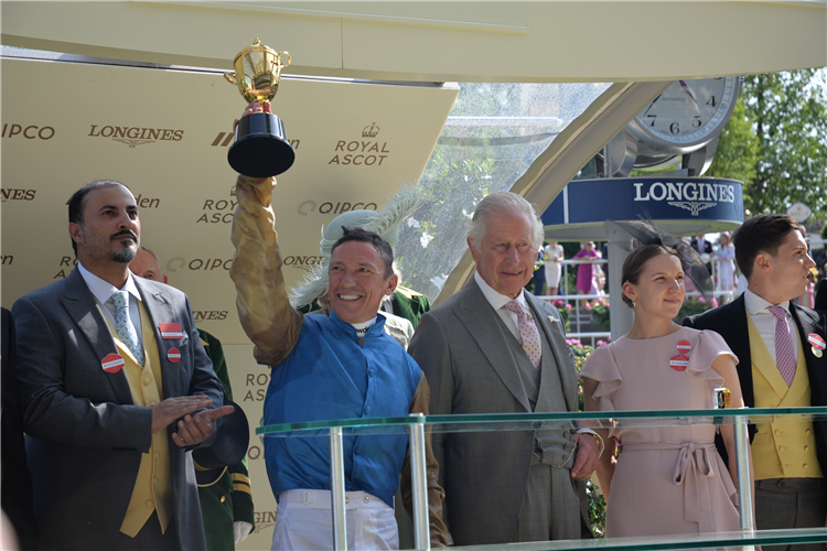 Frankie Dettori accepts the trophy from King Charles after winning the Gold Cup aboard Courage Mon Ami.