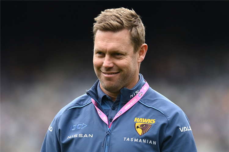 Hawks head coach SAM MITCHELL looks on during the AFL match between Geelong Cats and Hawthorn Hawks at MCG in Melbourne, Australia.