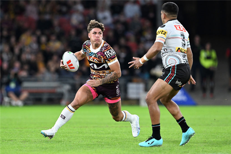 REECE WALSH of the Broncos runs the ball during the NRL match between Brisbane Broncos and Penrith Panthers at Suncorp Stadium in Brisbane, Australia.
