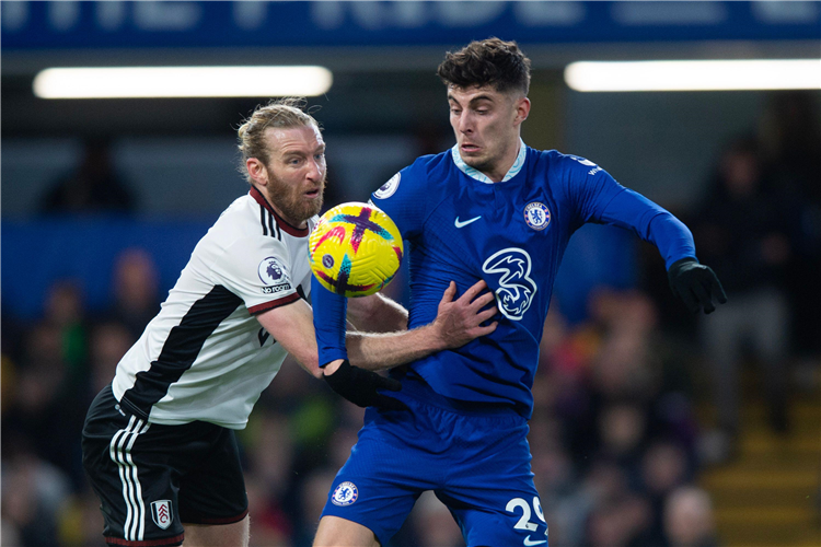 Kai Havertz of Chelsea and Tim Ream of Fulham battle for the ball