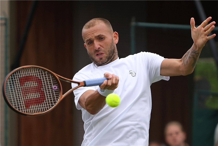 Dan Evans of Britain in action.