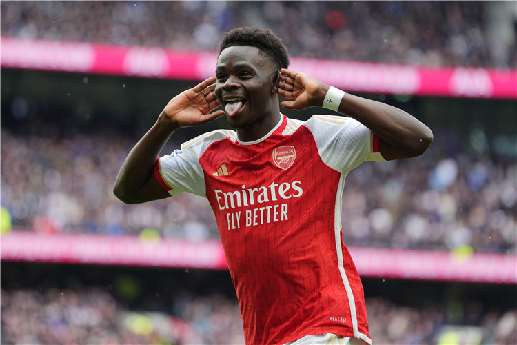 Arsenal's Bukayo Saka celebrates his goal against Tottenham