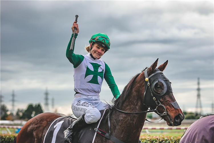 Denby-Rose Tait salutes after her win aboard Industrialist at Ascot Park on Sunday.