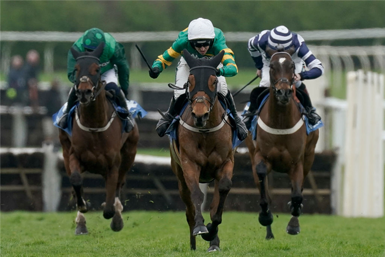 MYSTICAL POWER (white cap) winning the Top Novices' Hurdle at Aintree in Liverpool, England.