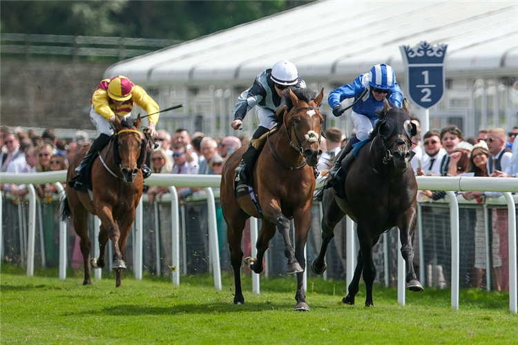 PASSENGER (white cap) winning the Huxley Stakes at Chester in England.