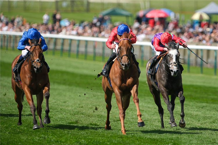 UNEQUAL LOVE (centre, blue cap) winning the Ellen Chaloner Stakes at Newmarket in England.