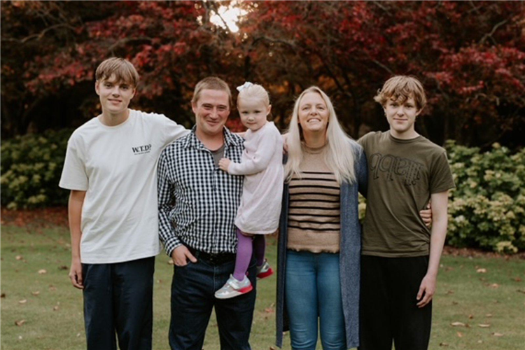 Amanda Higgins pictured with her family.