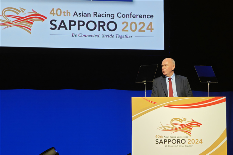 winning Former Hong Kong Jockey Club Chief Stipendiary Steward Mr Jamie Stier addresses the 40th Asian Racing Conference.the