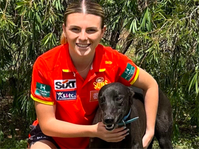 Greyhound trainer and AFLW recruit Keely Fullerton, with retired racer, Bell Topper (aka Baxter).