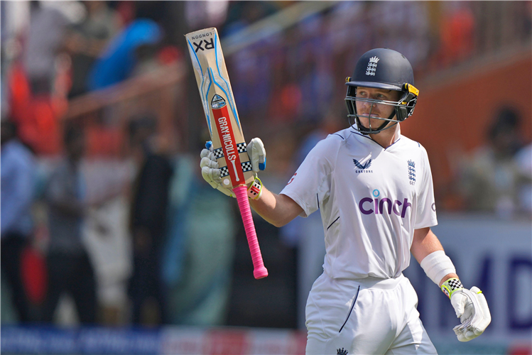 Ollie Pope raises his bat after making 196 in England's iconic victory against India