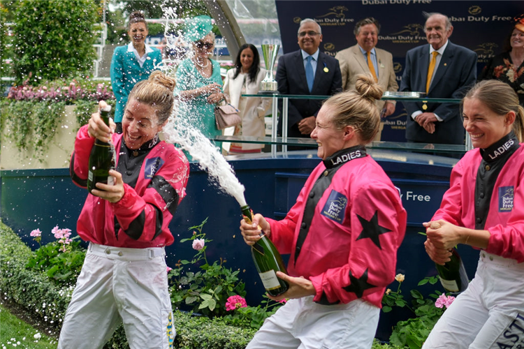 Hayley Turner (L), Joanna Mason (C) and Marie Velon after winning the Shergar Cup.