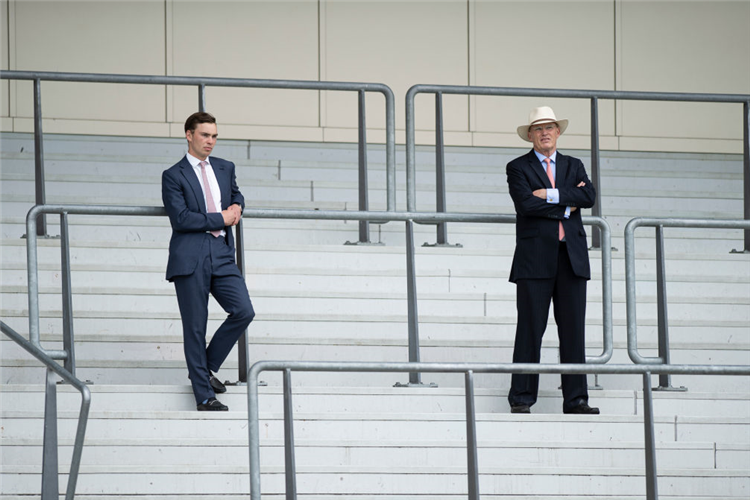 Trainer JOHN GOSDEN (R) and his assistant THADY GOSDEN watch Lord North win the Group 1 Prince Of Wales's Stakes during Day 2 of Royal Ascot in Ascot, England.
