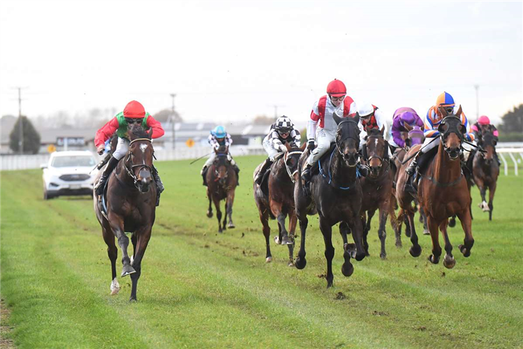 Astoria Brooke (outside) on her way to winning at Hawera.