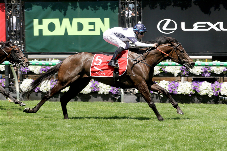 CABALLUS winning the G.H. Mumm Rising Fast Stakes at Flemington in Australia.