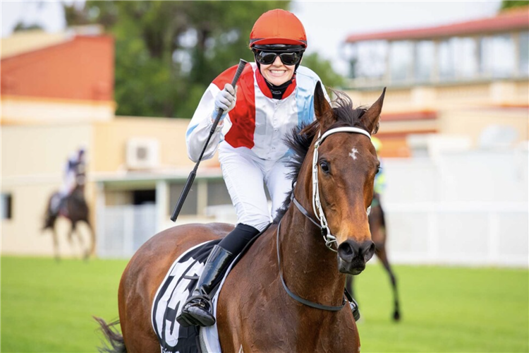 COMFORT ME and jockey Holly Watson