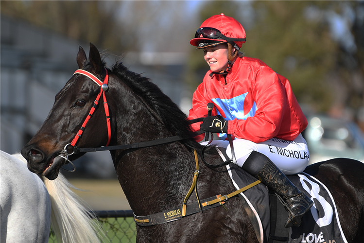 Elen Nicholas returns to the Te Rapa birdcage after winning aboard El Zoro