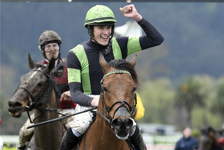 Jay Kozaczek celebrates Hill Of Kings' victory in the Pakuranga Hunt Hurdle.